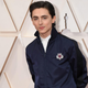 Illustration for article titled Nobody knows what to do with Timothée Chalamet’s Oscar look